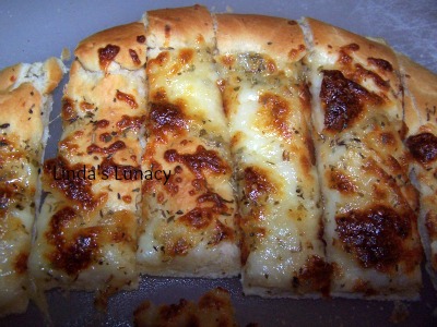 Homemade Pizza and Bread Sticks