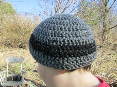 Crochet hat with grey reflective yarn