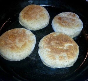 Homemade English muffins in cast iron skillet