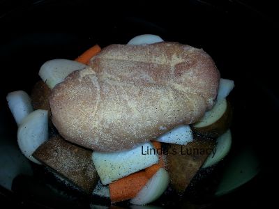 chicken potatoes onions carrots in slowcooker