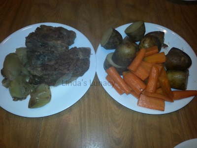 Slowcooker Beef Roast with potatoes carrots onions