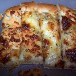 Homemade Pizza and Bread Sticks