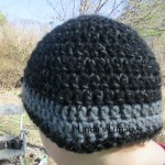 Crochet hat with black reflective yarn
