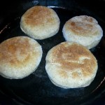 Homemade English muffins in cast iron skillet